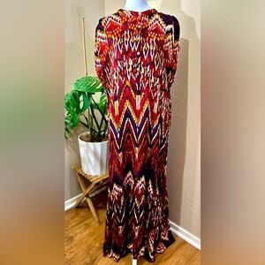 Floor length, cap sleeved dress.